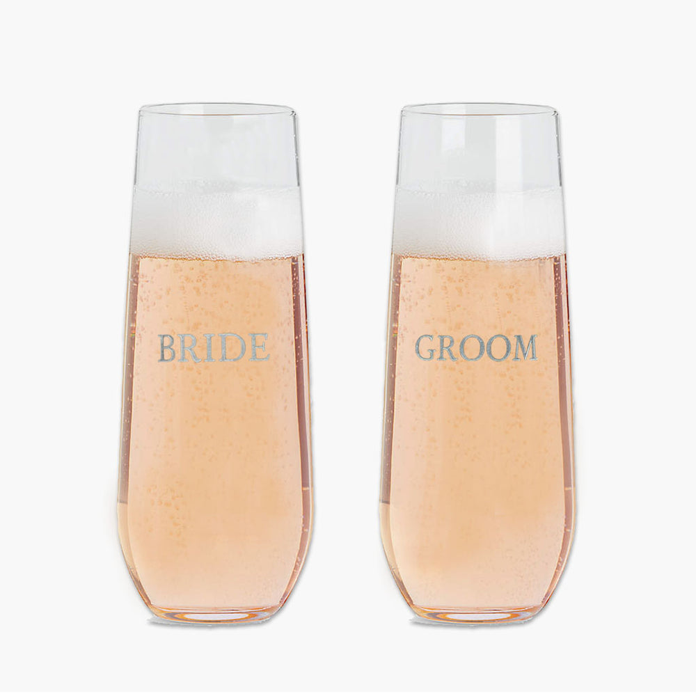 
            
                Load image into Gallery viewer, Bride and Groom Stemless Champagne Flutes
            
        