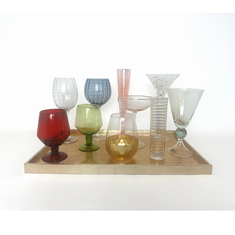 drink glasses on gold tray