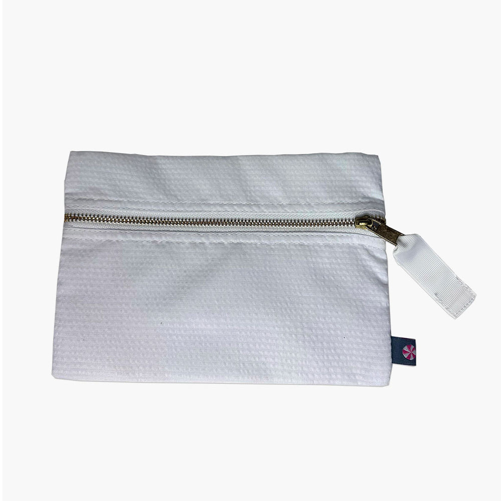 white seersucker cosmetic bag